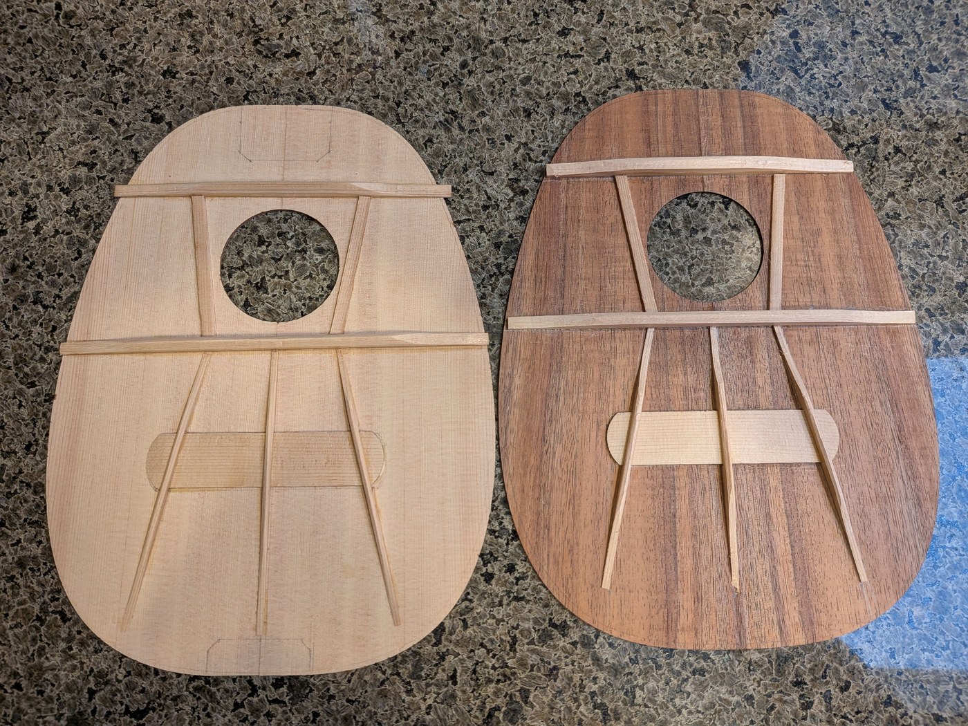 Two fan-braced tenor ukulele tops: two transverse bars, five fan struts, and a bridge plate